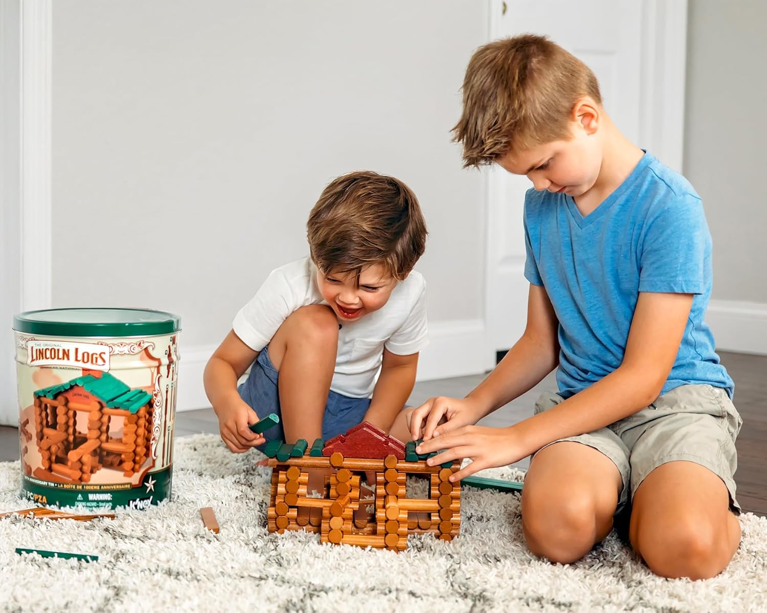 Children playing with Lincoln Logs